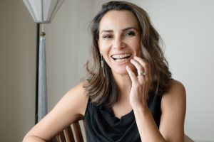 woman with clear braces smiling