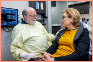 Dr Brown talking with a patient