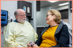 Dr White talking with a patient