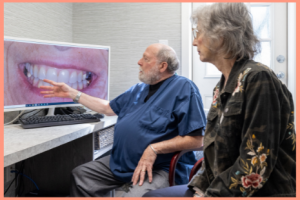 Dr White talking with a patient