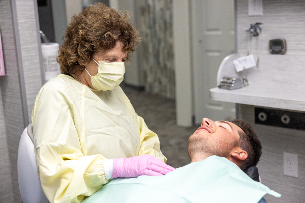 Gloria talking with a patient